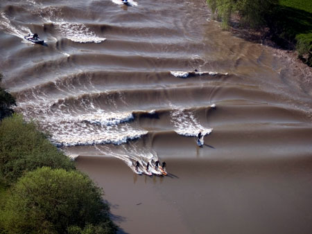 Surfers on the Severn bore (photograph by Mark Humpage, with thanks)